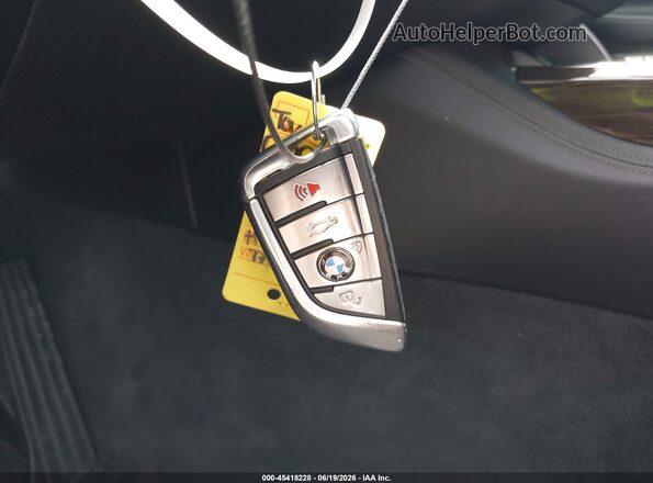 WBA7F0C53GGL99716 2016 BMW 7 SERIES Gray Vista del salpicadero