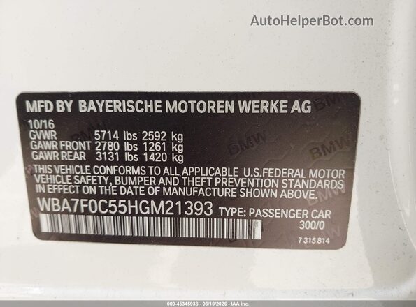 WBA7F0C55HGM21393 2017 BMW 7 SERIES White Vista del compartimento del motor