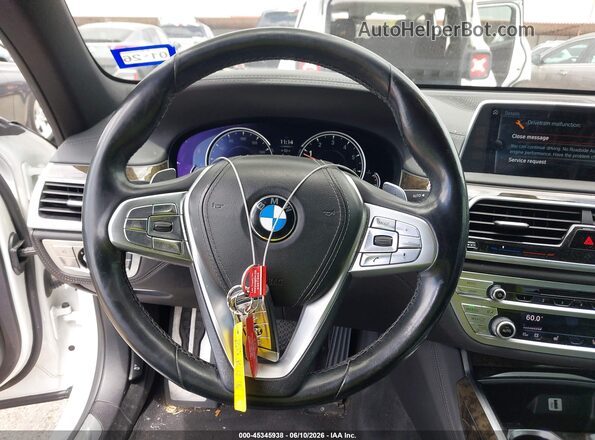 WBA7F0C55HGM21393 2017 BMW 7 SERIES White Vista del salpicadero
