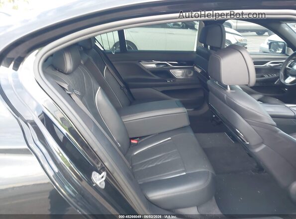 WBA7F0C5XKGM24653 2019 BMW 7 SERIES Black Vista de la etiqueta del VIN