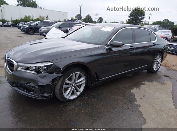 WBA7F2C54GG417989 2016 BMW 7 SERIES Gray Vista tres cuartos delantera izquierda