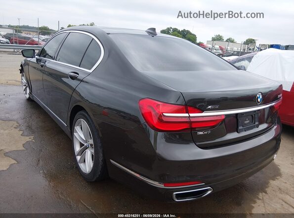 WBA7F2C54GG417989 2016 BMW 7 SERIES Gray Trasero izquierdo