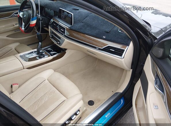 WBA7F2C54GG417989 2016 BMW 7 SERIES Gray Vista interior delantera
