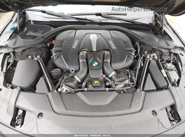 WBA7F2C54GG417989 2016 BMW 7 SERIES Gray Vista trasera
