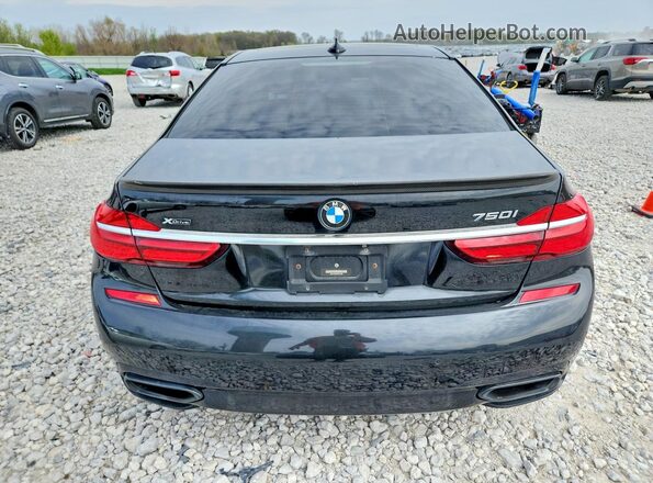 WBA7F2C56GGE12389 2016 BMW 7 SERIES Black უკანა ხედი