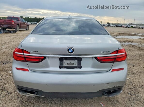 WBA7F2C57HG421875 2017 BMW 7 SERIES Silver Widok z tyłu