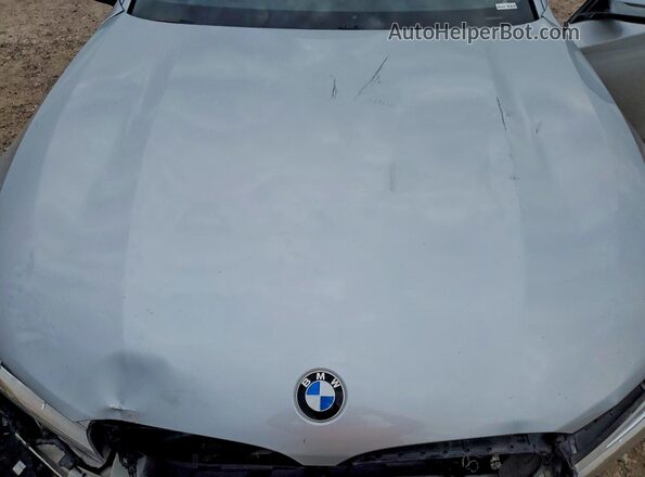 WBA7F2C57HG421875 2017 BMW 7 SERIES Silver Widok wnętrza z tyłu