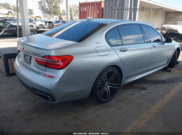WBA7H6C52JG614930 2018 BMW M760I Серебряный Задняя правая четверть