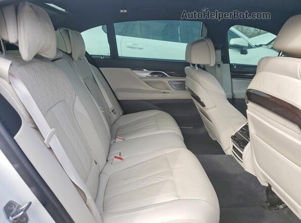 WBA7U2C08LGJ59237 2020 BMW OTHER White Rear seats view