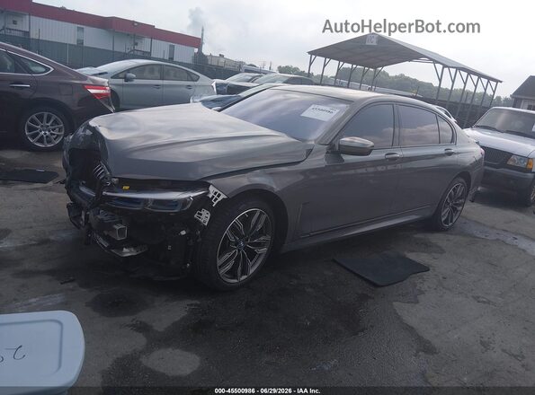 WBA7U6C02LBM63023 2020 BMW M760I Gray Առջևի ձախ երեք քառորդ տեսարան