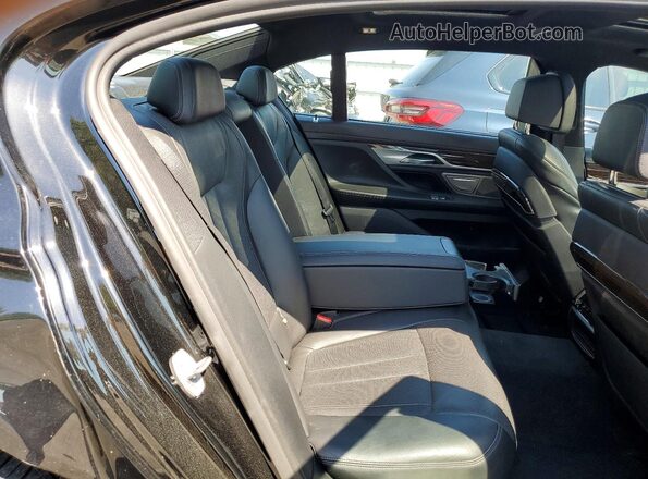 WBA7W4C05LCD34592 2020 BMW OTHER Черный Вид задних сидений