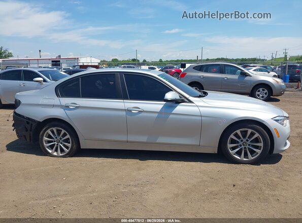 WBA8A3C51JA357995 2018 BMW 3 SERIES Silver Vista interior trasera