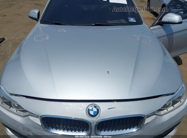 WBA8A3C51JA357995 2018 BMW 3 SERIES Silver Vista trasera