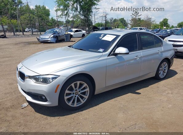 WBA8A3C51JA357995 2018 BMW 3 SERIES Silver Vista tres cuartos delantera izquierda
