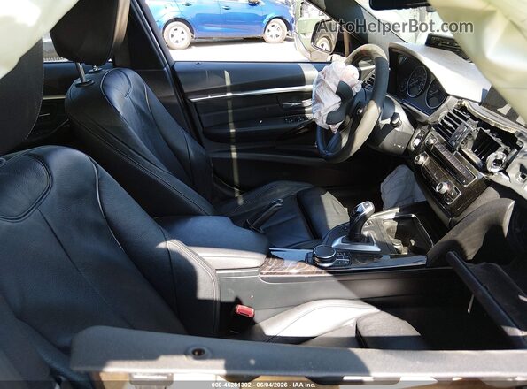 WBA8B7G31HNU38298 2017 BMW 3 SERIES Gray Вид салону спереду