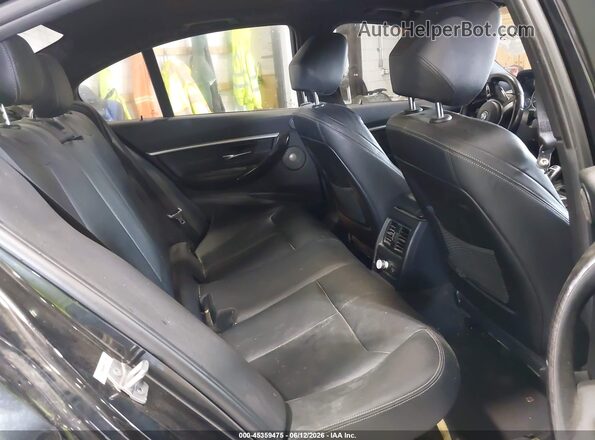 WBA8B7G32HNU37998 2017 BMW 3 SERIES Black Widok naklejki z numerem VIN