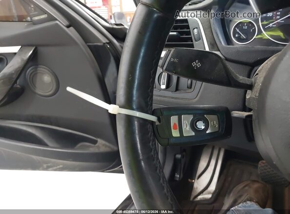WBA8B7G32HNU37998 2017 BMW 3 SERIES Black Widok deski rozdzielczej