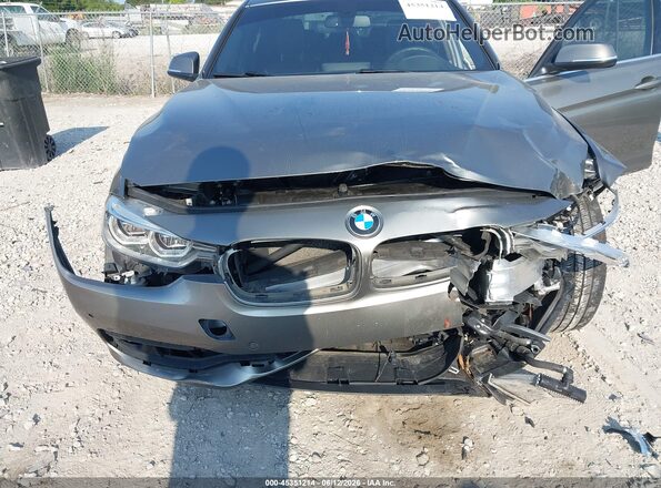 WBA8B7G59GNT70610 2016 BMW 3 SERIES Gray Front view