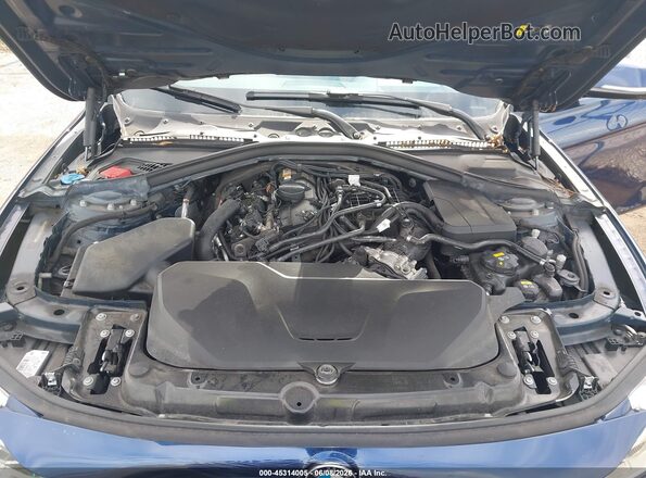 WBA8B9C57JEE81720 2018 BMW 3 SERIES Blue Rear view