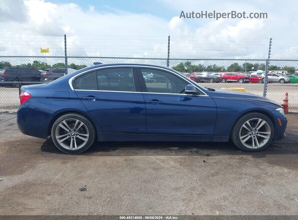 WBA8B9C57JEE81720 2018 BMW 3 SERIES Blue Rear interior view