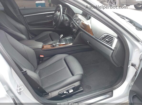 WBA8B9G32HNU56918 2017 BMW 3 SERIES Silver Вид салону спереду