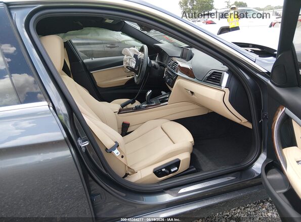 WBA8B9G55JNU99737 2018 BMW 3 SERIES Gray Front interior view
