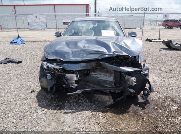 WBA8B9G55JNU99737 2018 BMW 3 SERIES Gray Rear interior view