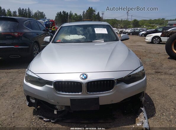 WBA8D9C30HA004506 2017 BMW 3 SERIES Silver Սալոնի հետևի տեսք