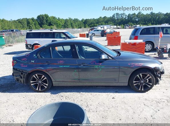 WBA8D9C52JEM33016 2018 BMW 3 SERIES Gray Rear interior view