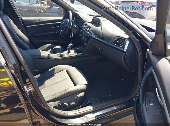 WBA8D9G56JNU68670 2018 BMW 3 SERIES Black წინა სალონის ხედი