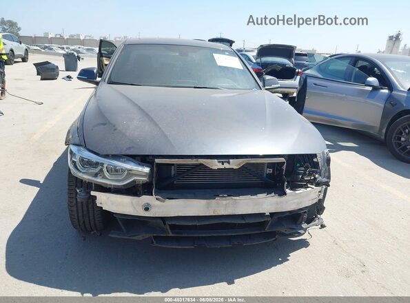WBA8E1C37HA158726 2017 BMW 3 SERIES Gray Rear interior view