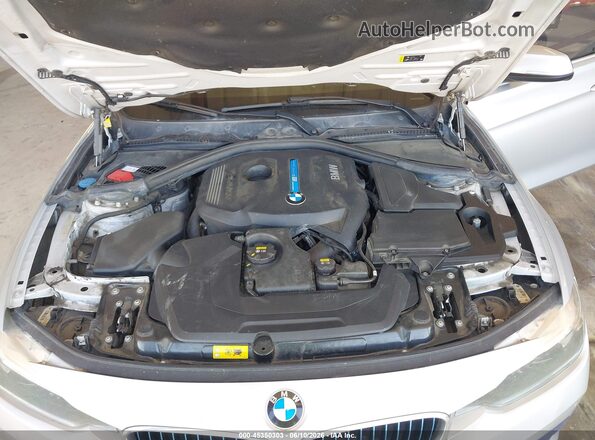 WBA8E1C38HA156953 2017 BMW 3 SERIES Silver Rear view