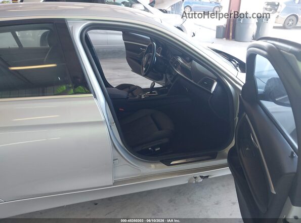 WBA8E1C38HA156953 2017 BMW 3 SERIES Silver Front interior view