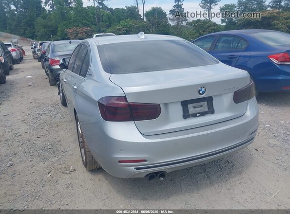 WBA8E1C55JA762976 2018 BMW 3 SERIES Silver Trasero izquierdo
