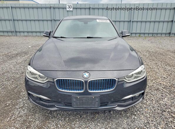 WBA8E1C56GK478534 2016 BMW OTHER Black Front view