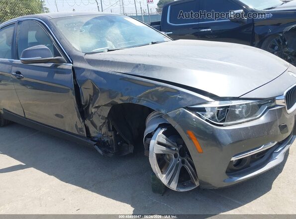 WBA8E1C5XJA755974 2018 BMW 3 SERIES Black წინა ხედი