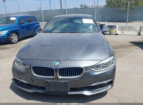 WBA8E1C5XJA755974 2018 BMW 3 SERIES Black ხელსაწყოთა პანელის ხედი