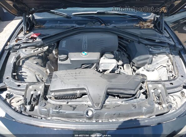 WBA8E1G5XGNT38382 2016 BMW 3 SERIES Black Rear view