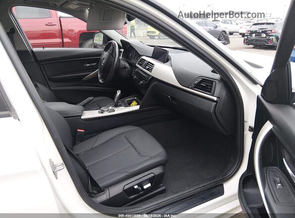 WBA8E5G32HNU43747 2017 BMW 3 SERIES White Front interior view