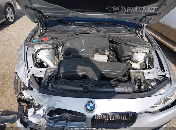WBA8E5G54JNU46334 2018 BMW 3 SERIES Silver უკანა ხედი