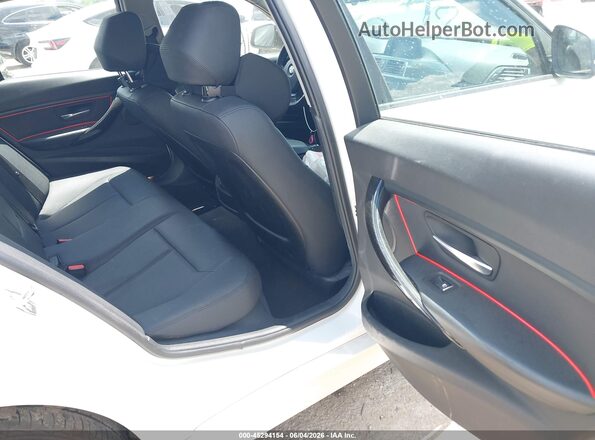 WBA8E5G55JNV02121 2018 BMW 3 SERIES White Вид наклейки з VIN-кодом