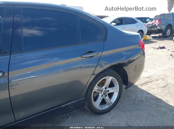 WBA8E9G51GNT43663 2016 BMW 3 SERIES Gray Widok z przodu