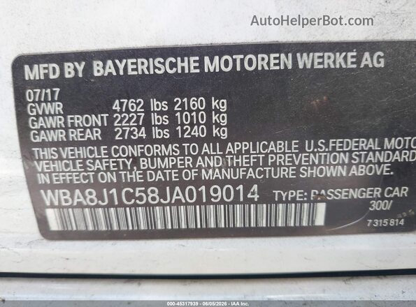 WBA8J1C58JA019014 2018 BMW 3 SERIES White Engine compartment view