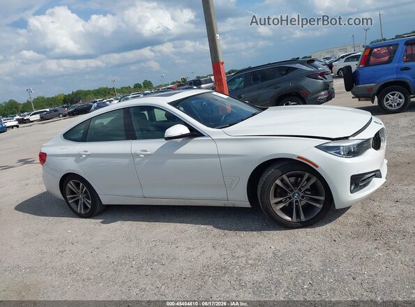 WBA8Z9C56JB220007 2018 BMW 3 SERIES White Vista interior trasera