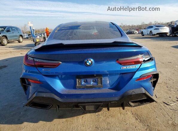 WBABC4C58KBU95843 2019 BMW M8 Blue Rear view