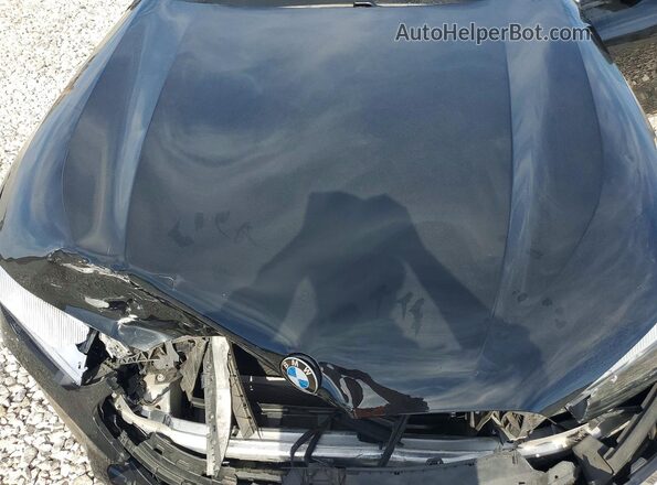 WBADZ2C09NCH84019 2022 BMW 7 SERIES Черный Вид задней части салона
