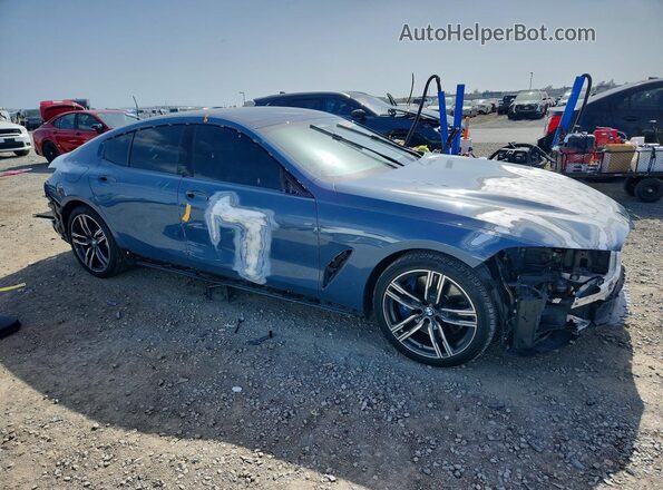 WBAGV2C04MCE91832 2021 BMW 8 SERIES Blue Front right