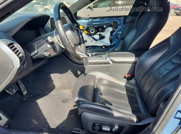 WBAGV2C04MCE91832 2021 BMW 8 SERIES Blue Front interior view