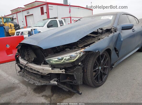 WBAGV2C08LCE77558 2020 BMW 8 SERIES Синий Вид спереди