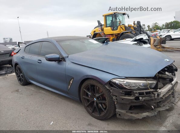 WBAGV2C08LCE77558 2020 BMW 8 SERIES Синий Вид задней части салона